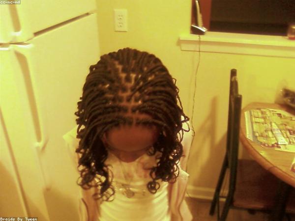 Finished knotless braids styled at Braids & Beyond