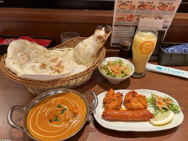 Butter chicken and naan served at Cilantro