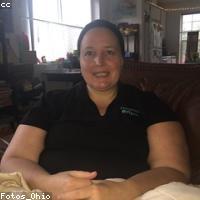 Massage therapist's hands on a client's back