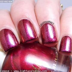 Hands with freshly painted gel nails