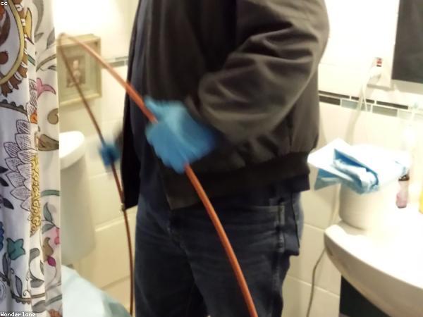 Tafadzwa Moyo fitting a new geyser element