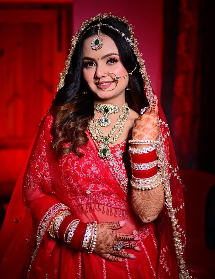 Embroidered bridal lehenga displayed on a mannequin in a boutique