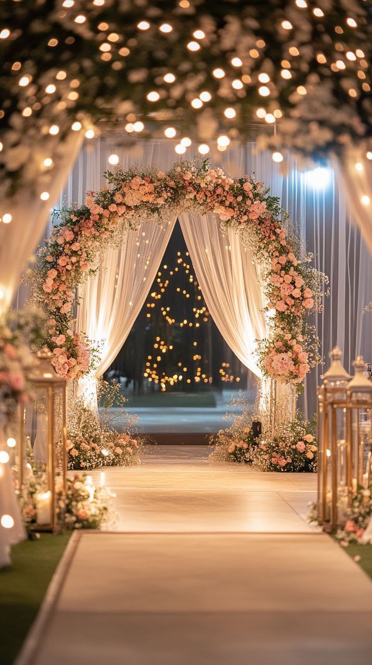 Floral mandap decor with hanging blooms and soft evening lighting
